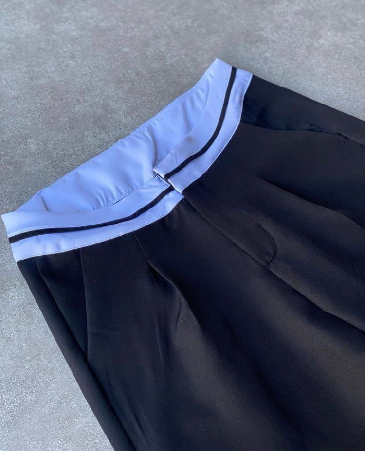 Pantalon pretina blanca